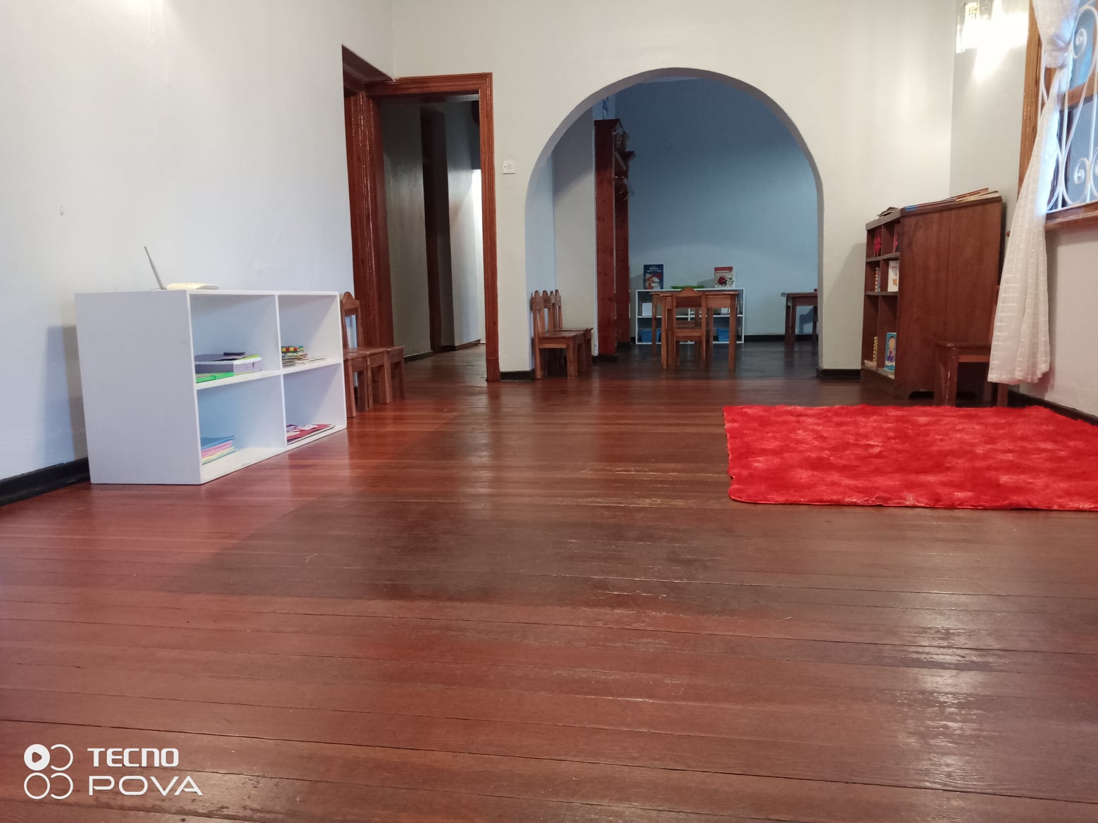 Khaya Montessori classroom interior with wooden arch